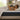 Couple sleeping on their sides on a mattress